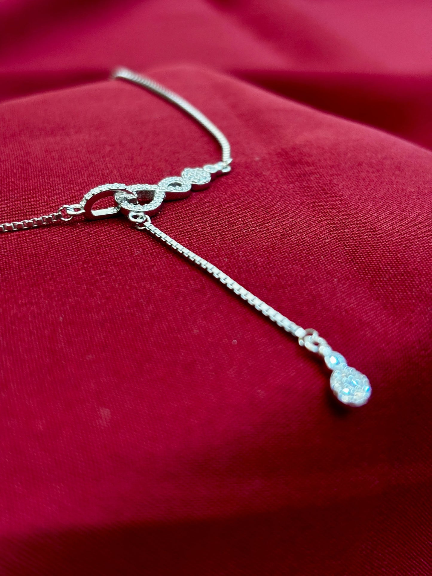 Infinity Knot Drop Silver Pendant - Eraya Jewellery