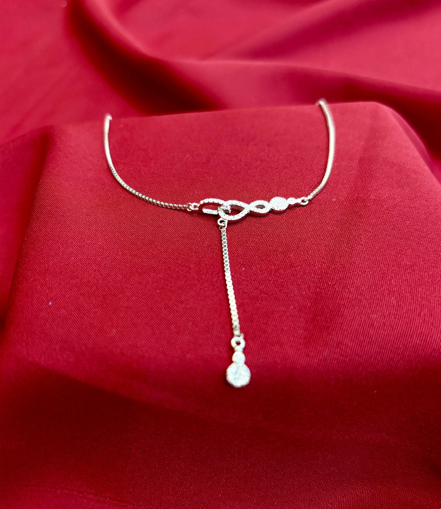 Infinity Knot Drop Silver Pendant - Eraya Jewellery