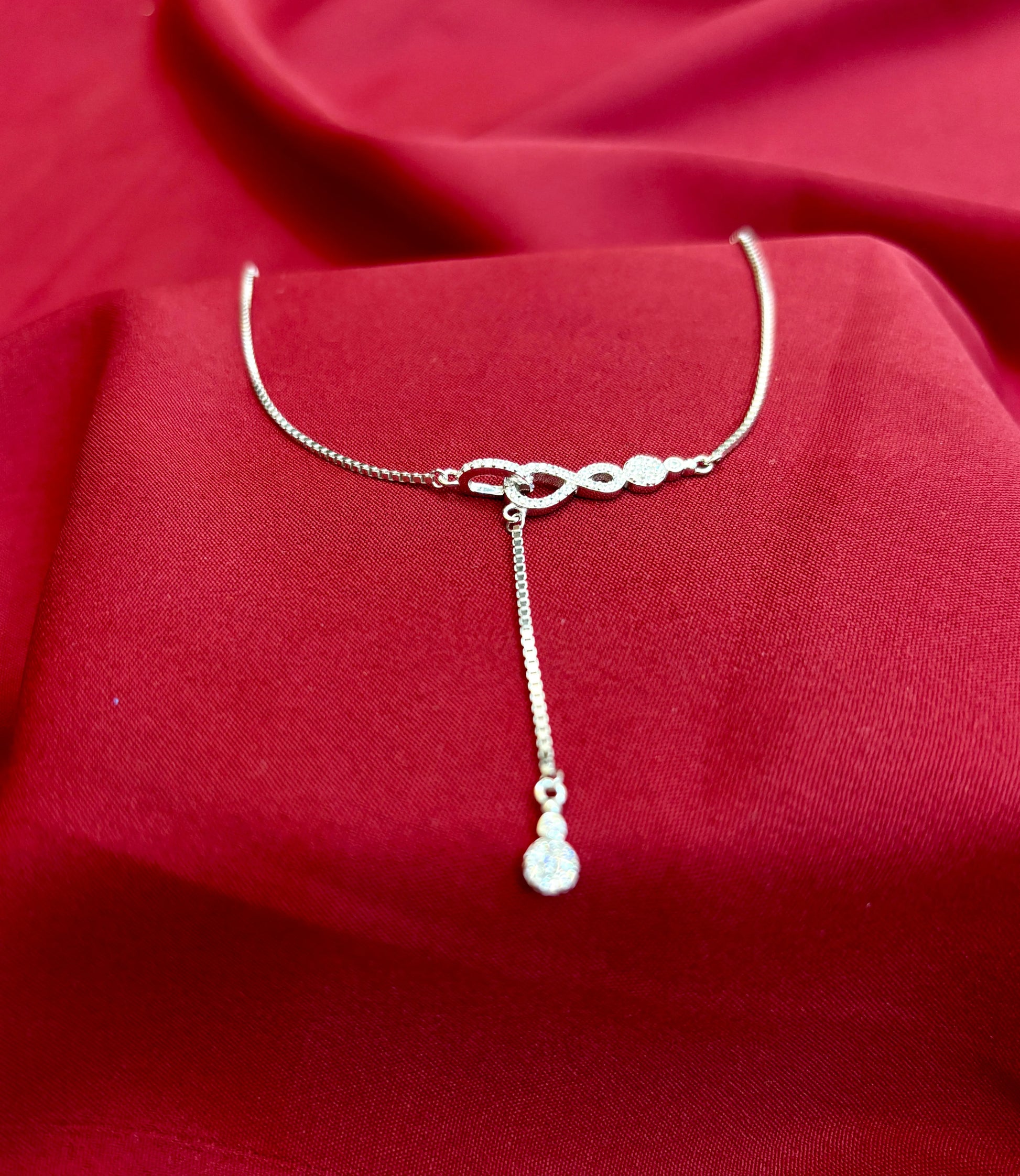 Infinity Knot Drop Silver Pendant - Eraya Jewellery