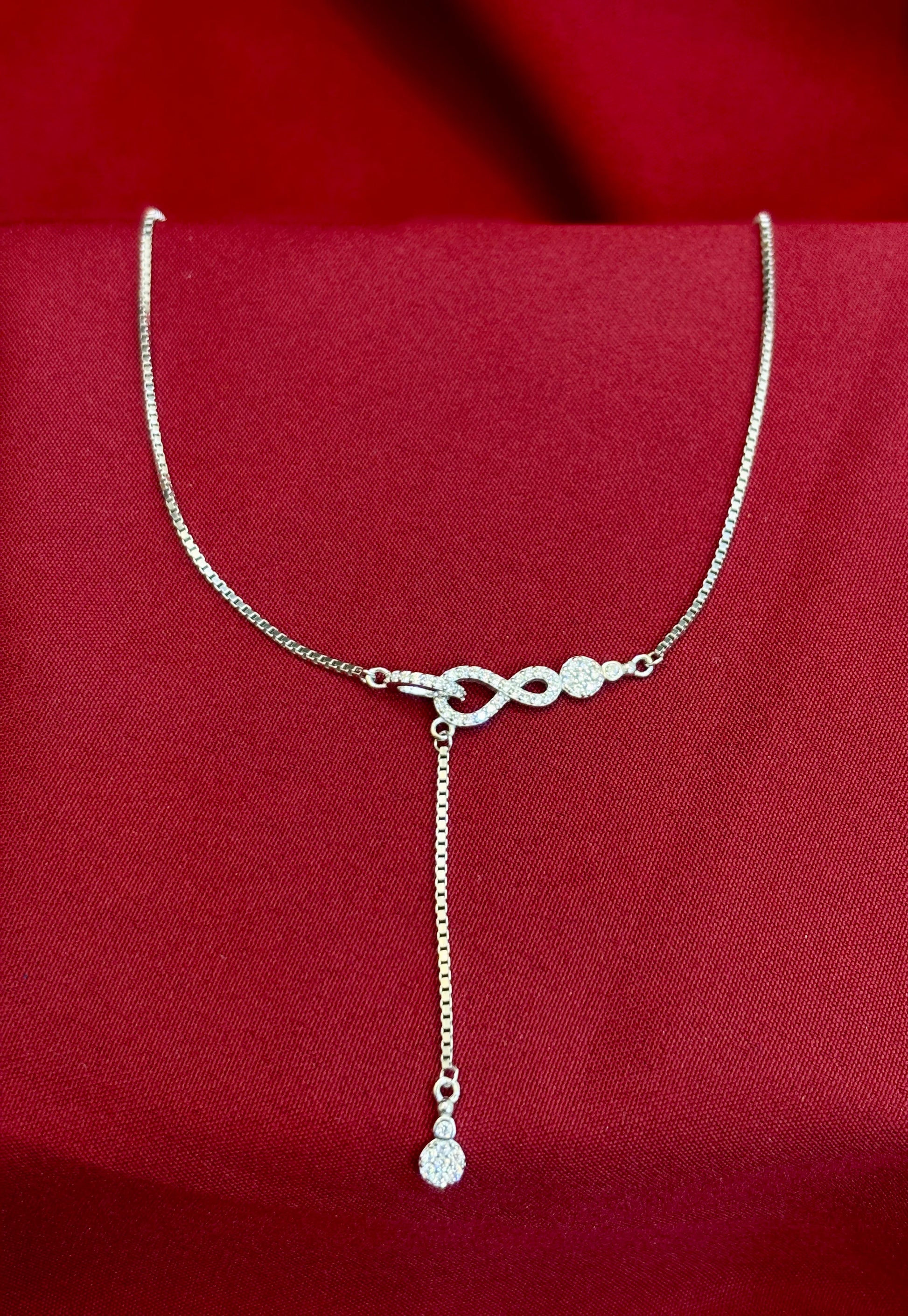 Infinity Knot Drop Silver Pendant - Eraya Jewellery